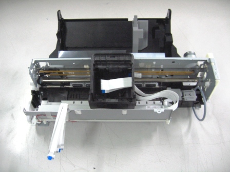 Assembled printer mechanism with metal frame and feed components